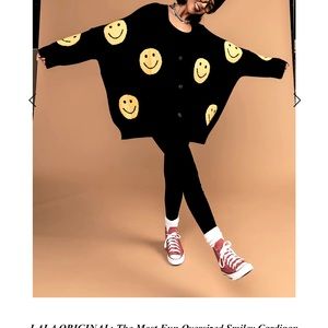 Smiley cardigan runs oversized